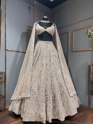 Champagne colour pearl work lehenga